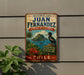 A vintage-style metal sign with a bird perched on a rock, depicting a tropical island landscape with palm trees and a blue sky.
