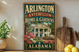 A vintage-style sign for "Arlington Antebellum Home & Gardens" in Alabama, featuring a large illustration of a house surrounded by flowers and greenery.