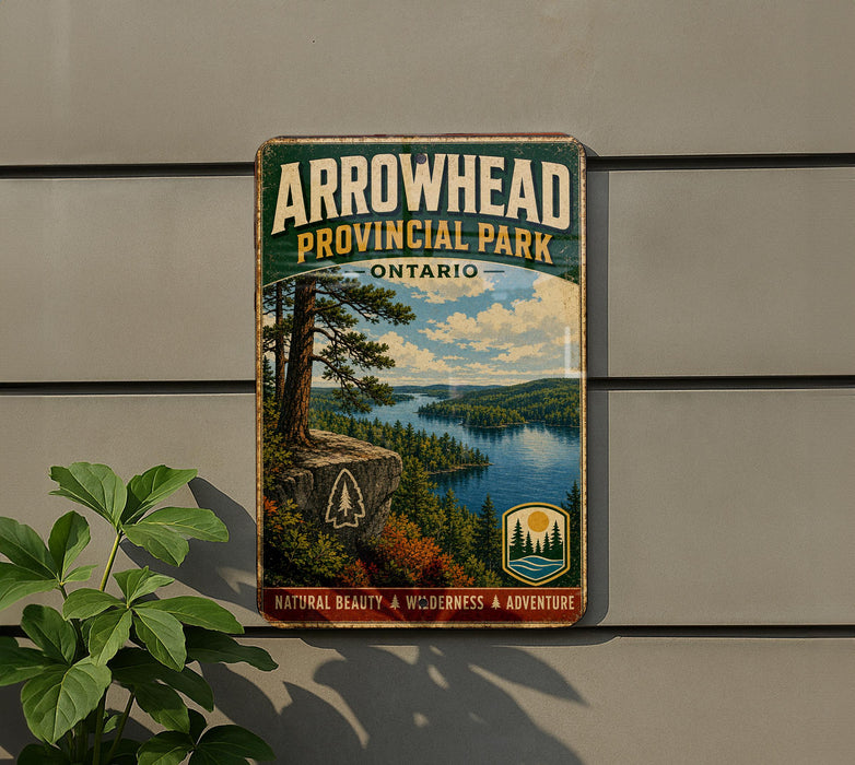 A vintage-style metal sign for Arrowhead Provincial Park, Ontario, featuring a scenic landscape with a lake, mountains, and pine trees.