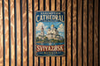 A vintage metal sign with the text "Assumption Cathedral and Monastery" and "Svyazhsk Russia" is displayed on a wooden wall.