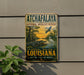 A vintage-style metal sign for Atchafalaya National Wildlife Refuge in Louisiana, featuring an illustration of wildlife and a sunset landscape.