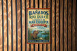 A vintage-style metal sign with a picture of a capybara and text advertising Banados de Rio Dulce, Laguna de Mar Chiquita, and Argentina.