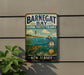 A vintage metal sign for Barnegat Bay, New Jersey, featuring a lighthouse, turtle, and seagull, is displayed on a wall next to a plant.