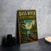 A vintage-style metal sign for the Bass River State Forest in New Jersey, featuring a scenic illustration of a canoe on a river surrounded by pine trees.