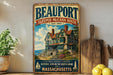 A vintage-style sign for the Sleeper-McCann House, a historic landmark in Beauport, Massachusetts, established in 1907.
