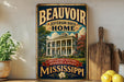 A vintage-style sign for "Beauvoir Jefferson Davis Home" is displayed on a wooden shelf, surrounded by kitchen utensils and a potted plant.