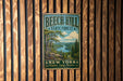 A vintage metal sign for Beech Hill State Forest in New York, featuring a scenic landscape with a river and mountains.