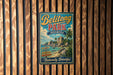 A vintage-style metal sign for Belitong Park in Indonesia, featuring a tropical beach scene with palm trees and rocks.
