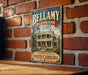 A vintage-style sign for Bellamy Mansion, a historic home located in Winston-Salem, North Carolina.