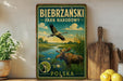 A vintage-style metal sign for the Biebrzanski Park in Narodowy, Poland, featuring a moose and a bird in a natural landscape.