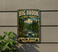 A vintage-style metal sign for Big Brook State Forest in New York, featuring a scenic image of a forest and a river.