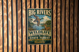 A vintage-style metal sign for the Big Rivers Wildlife Management Area in Kentucky, featuring a duck and deer in a natural setting.