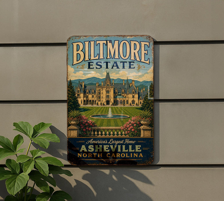 A vintage-style metal sign for Biltmore Estate, featuring an illustration of the estate's historic architecture and landscaping.