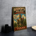 A vintage-style metal sign for Bishop's Palace, a Texas treasure, featuring an illustration of a castle-like building with a red roof and surrounded by trees.