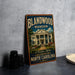 A vintage-style sign for the Blandwood Mansion in Greensboro, North Carolina, featuring an illustration of the mansion and the text "A Timeless Legacy" and "A Greensboro North Carolina".