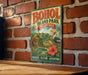 A vintage-style metal sign for BOHOL ISLAND PARK, Philippines, featuring an illustration of a bird, palm trees, and mountains, along with the text "BOHOL ISLAND PARK PHILIPPINES" and "DISCOVER NATURE WILDLIFE CULTURE ADVENTURE".