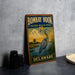 A vintage-style metal sign for the Bombay Hook National Wildlife Refuge in Delaware, featuring an illustration of a crane standing in a marshy area with a bird in the background.