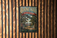 A vintage-style metal sign for Boone Hall Plantation in South Carolina, featuring a large illustration of a plantation with a house and palm trees.