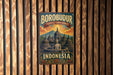 A vintage metal sign with the text "BOROBUDUR TEMPLE COMPOUNDS INDONESIA" and an illustration of a temple with a Buddha statue.