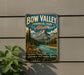 A vintage-style metal sign for Bow Valley Provincial Park, Alberta, featuring a scenic mountain landscape with a river and pine trees.