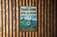 a vintage-style metal sign with a tropical beach scene, including a lighthouse, palm trees, and a blue ocean.