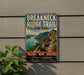 A vintage-style metal sign for the Breakneck Ridge Trail in New York, featuring a scenic mountain landscape with a winding trail and the text "BREAKKNACK RIDGE TRAIL NEW YORK CHALLENGE VIEWS ADVENTURE Hudson Highlands TAKE A HIKE FIND YOUR SUMMIT".