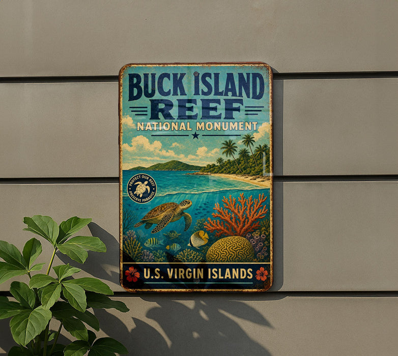 A vintage-style metal sign for Buck Island Reef National Monument, featuring a tropical beach scene with palm trees, colorful coral, and a sea turtle swimming in the ocean.