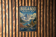 A vintage-style metal sign for Bugaboo Provincial Park in British Columbia, featuring a mountain landscape with text that reads "Wild Rugged Majestic".