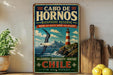 A vintage-style sign for Cabo de Hornos, a lighthouse located in the Pacific Ocean, Chile. The sign features a lighthouse and a seagull, along with text promoting the biodiversity and heritage of the region.