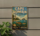 A vintage metal sign for Cape Romain, a protected marine area in South Carolina, featuring a lighthouse, turtle, and fish.