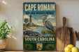a vintage-style sign for the Cape Romain National Wildlife Refuge in South Carolina, with a coastal scene and a large bird.