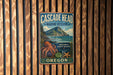 A vintage metal sign for the Cascade Head Marine Reserve in Oregon, featuring an illustration of an octopus, a mountain, and a starfish.
