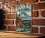 A vintage metal sign for the Cascade Head Marine Reserve in Oregon, featuring an illustration of a rocky coastline, an octopus, and a starfish.