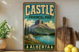 A vintage-style sign for Castle Provincial Park in Alberta, Canada, featuring a mountain landscape with a lake and pine trees.