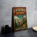 A vintage metal sign for the Cathedral Spires Trail in South Dakota, featuring a scenic mountain landscape.