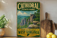 A vintage-style poster of Cathedral State Park in West Virginia, featuring a scenic landscape with towering cliffs and lush greenery.