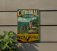 A vintage-style sign for Cathedral State Park in West Virginia, featuring a scenic mountain landscape with rocky cliffs and lush vegetation.