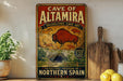 a vintage-style sign for the Cave of Altamira, a paleolithic cave art located in Northern Spain.