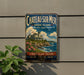 A vintage-style metal sign for Chateau Sur-Mer, a luxury resort on Rhode Island, featuring a picturesque coastal scene with a large house and a sailboat.