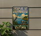A vintage metal sign for Chesapeake Bay National Estuarine Research Reserve, featuring a bird and a duck in a grassy landscape with a body of water.