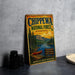 A vintage metal sign for Chippewa National Forest in Minnesota, featuring a scenic landscape with a lake, mountains, and a canoe.
