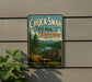 A vintage-style sign for Chuck Swan State Forest in Tennessee, featuring a scenic landscape with pine trees, a river, and mountains.