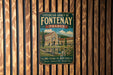 A vintage metal sign for the Cistercian Abbey of Fontenay, France, featuring an illustration of the abbey and a quote about its history.