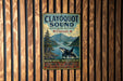 A vintage-style metal sign for Clayoquot Sound, a wildlife reserve in Canada, featuring a whale and a forest landscape.