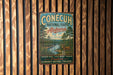A vintage metal sign for Conecuh National Forest in Alabama, featuring a scenic illustration of the forest and wildlife.
