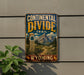 A vintage metal sign for the Continental Divide Trail in Wyoming, featuring a scenic mountain landscape and a trail marker.