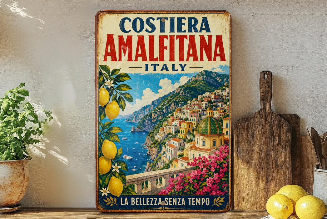 A vintage-style metal sign with a colorful illustration of the Amalfitana island in Italy, featuring a scenic view of the coastline and buildings.