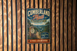 A vintage metal sign for the Cumberland Trail in Tennessee, featuring a scenic mountain landscape and the text "A TRAIL LIKE NO OTHER"