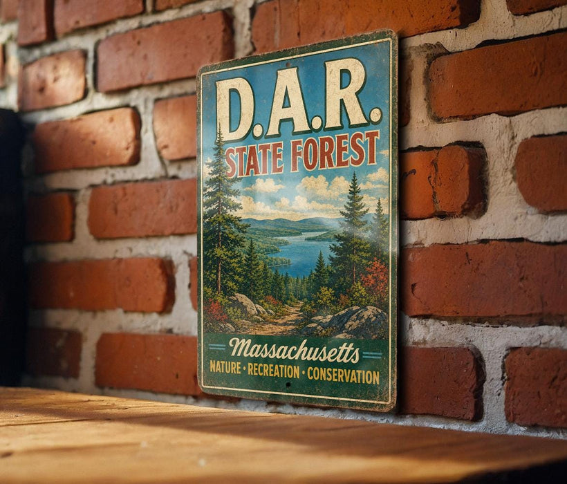 A vintage metal sign for the D.A.R. State Forest in Massachusetts, featuring a scenic landscape with pine trees, mountains, and a lake.
