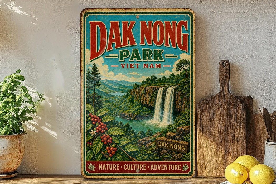 A vintage-style sign for the "Dak Nong Park" in Vietnam, featuring a scenic landscape with a waterfall and lush greenery.